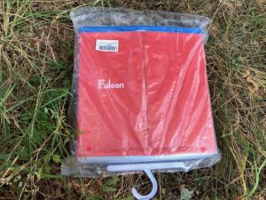 Hundepool von Fuloon in rot in einer Plastiktüte zusammen gefaltet verpackt